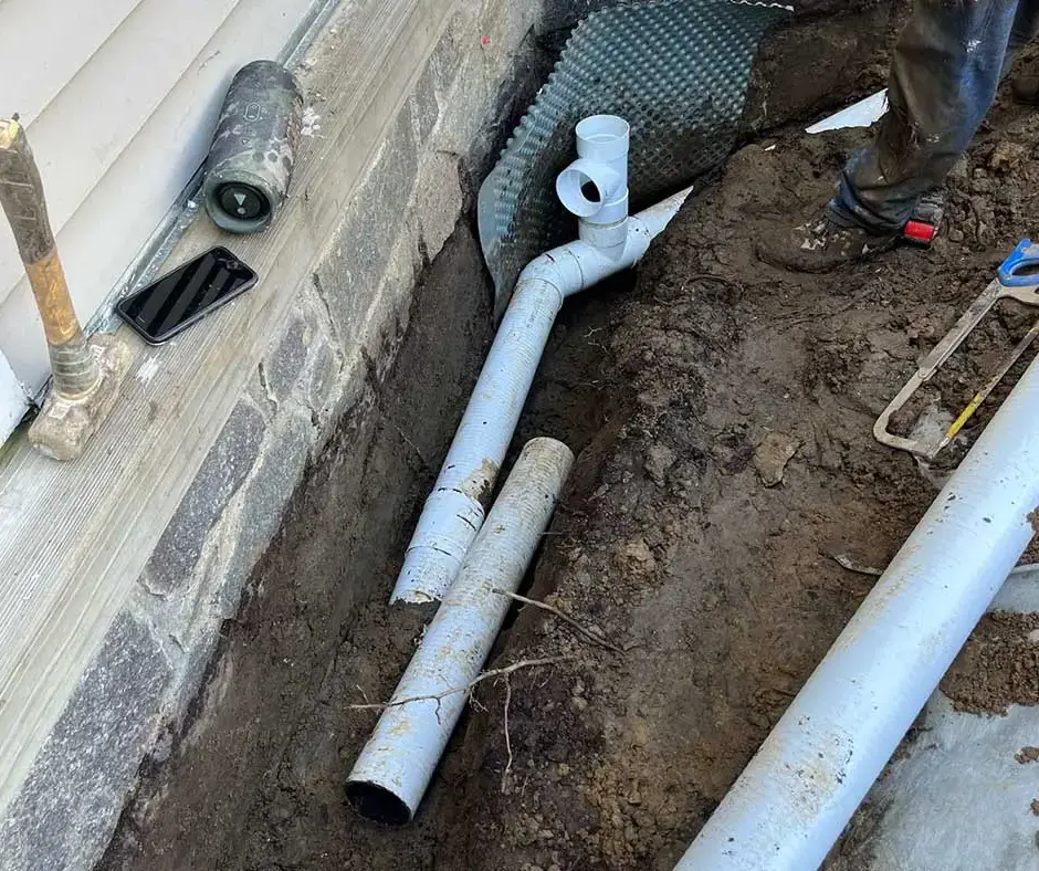White PVC pipes French Drain Installation Rochester, NY White PVC pipes French Drain Installation Rochester, NY