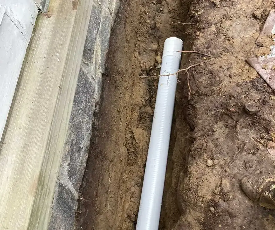 Long PVC pipe French Drain Installation Rochester, NY