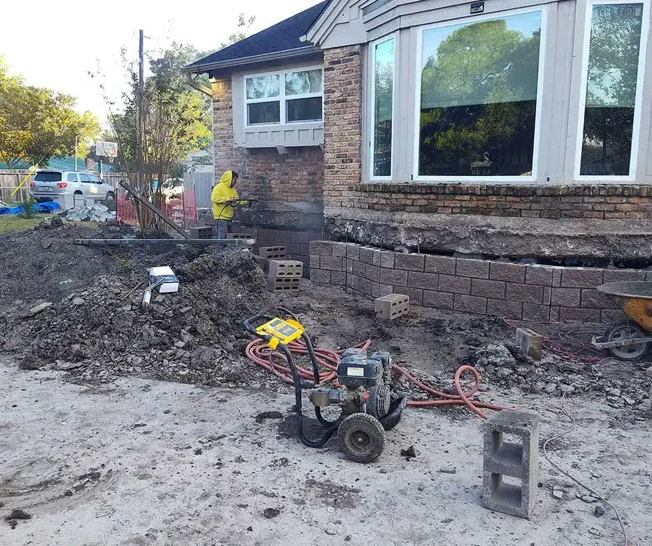 Workers rebuilding Foundation Repair Rochester, NY